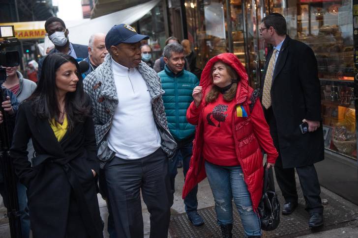 Mayor Eric Adams walks with a crowd in Brooklyn alongside local Councilmember Irina Vernikov in March.